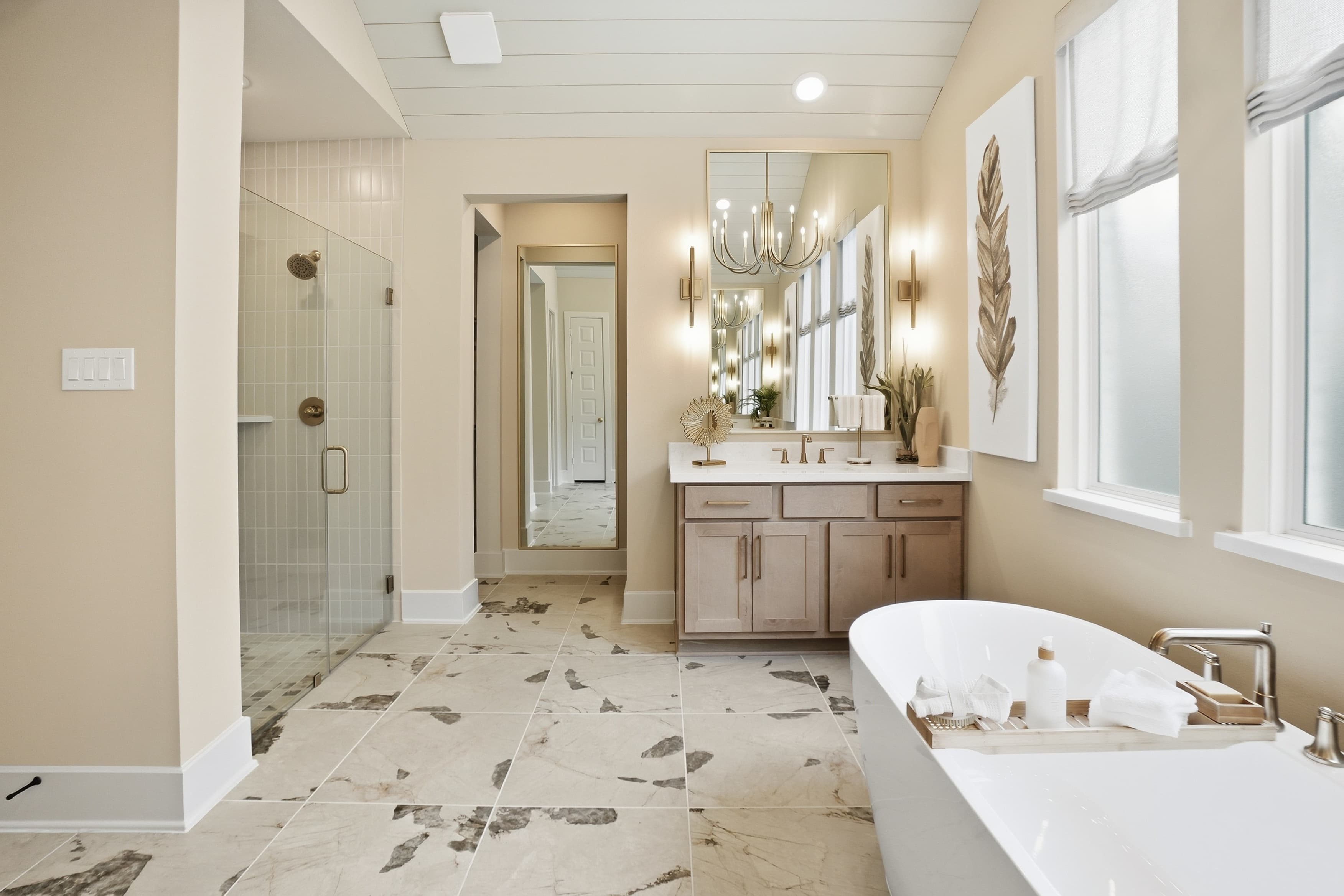 Bathroom with freestanding tub and glass shower — 42030 Texoma Way